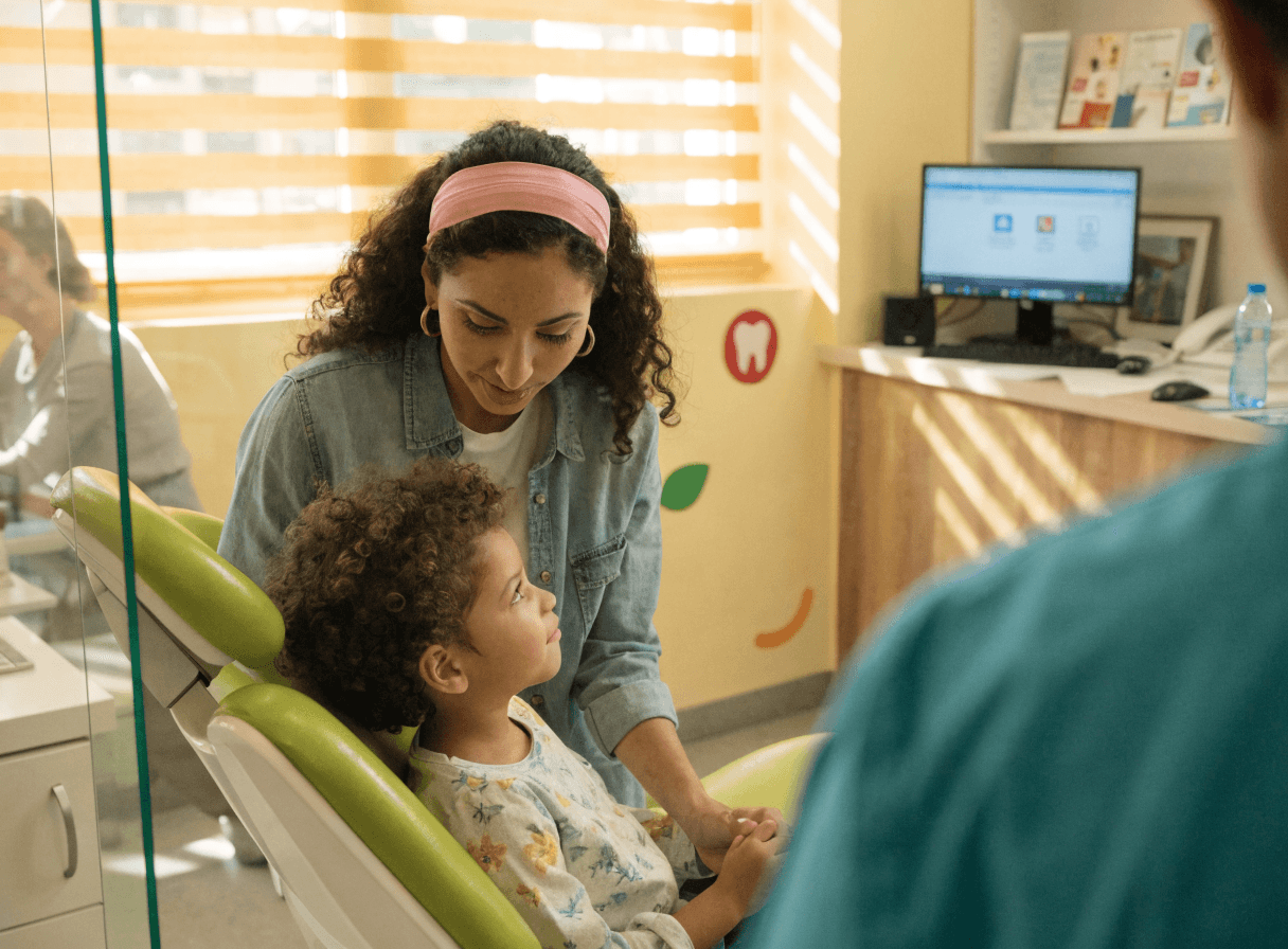 Mother comforting child at Tooth Time Dentistry Hartford